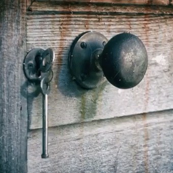 gif of a key swinging next to a lock